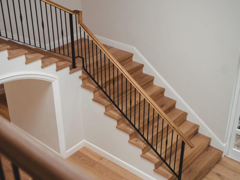 Wooden Staircase with Iron Spindles and Oak Handrail